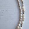 שרשרת לאישה,mfcollection jewelry,מעצבת תכשיטים,מיה פינקלשטיין,פנינה שחורה,מיה תכשיטים,שרשרת פנינה,פנינים שחורות,שרשרת פנינים לבנות,פנינה לבנה